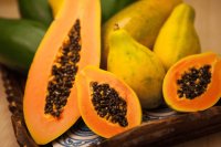 How can you tell if a papaya is ripe?