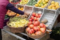 Selling fresh produce at a market stall Which farmers say the prices they receive are unfair