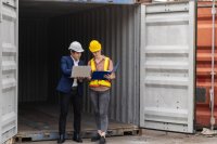 Inspectors checking a shipping container The EU's new customs code writes AI into customs risk analysis