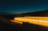 Greenhouse lit with supplementary lighting at night Why a more efficient lamp saves less energy than its specification suggests